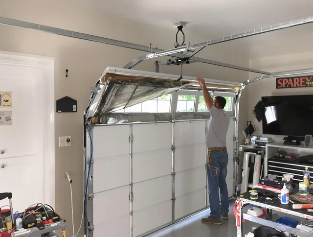 Garage door section replacement by Macedonia Garage Door Repair in Macedonia