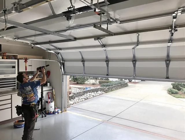 Garage door track repair service by Macedonia Garage Door Repair in Macedonia